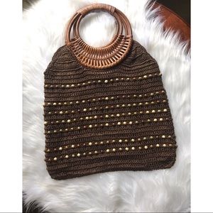 Wood handle crocheted beaded bag
